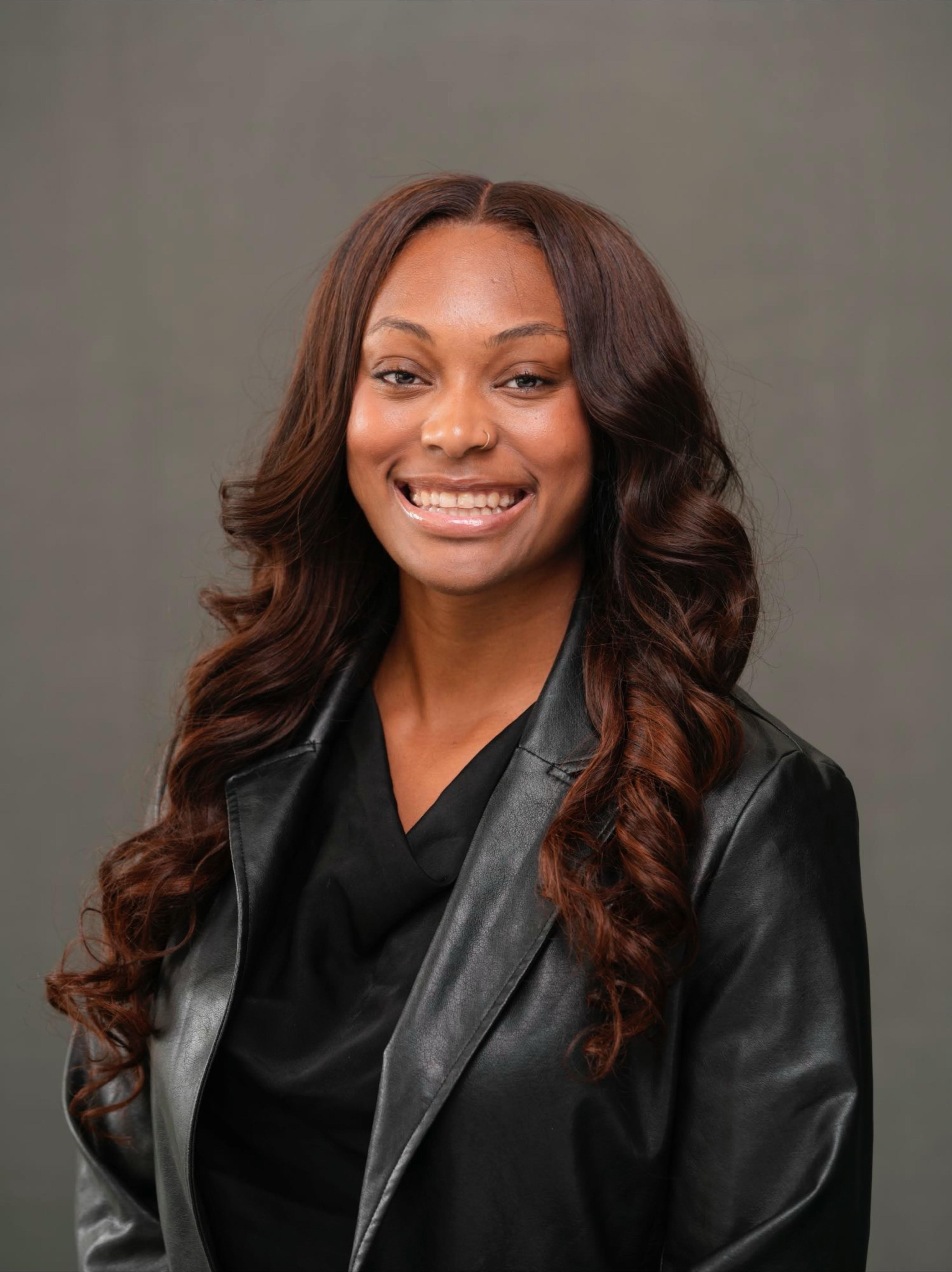 Amoura Whitney — Founder & Principal